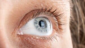 A close-up shot of a blue eye